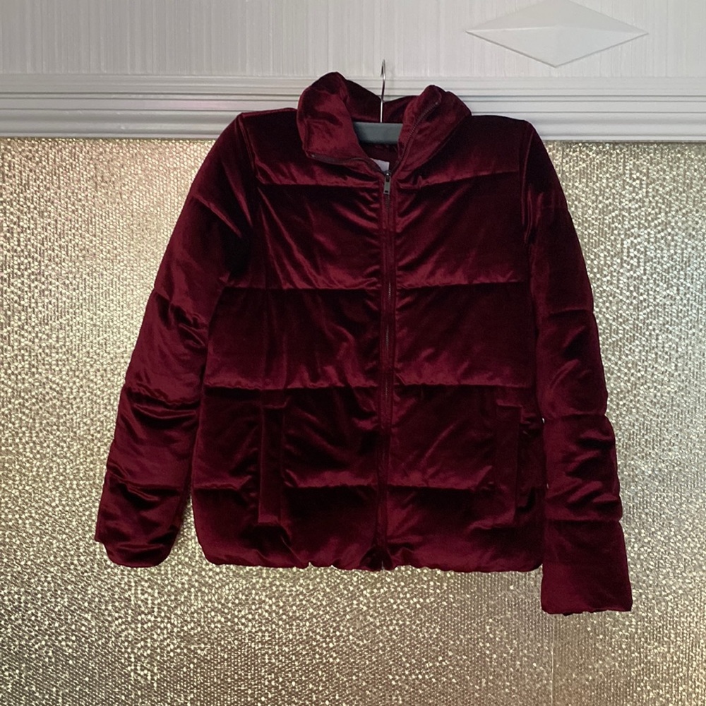 This a red velvet material puffer jacket form Old Navy.